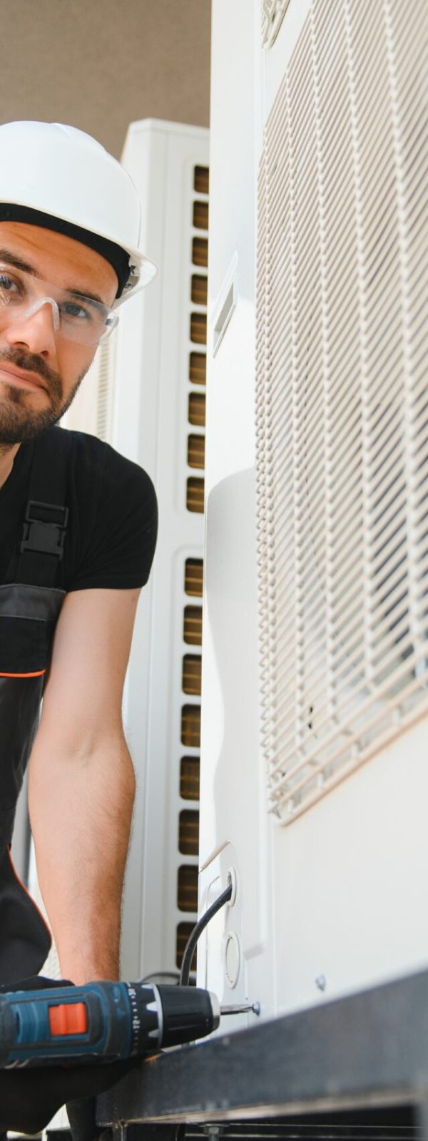 Technician man install new air conditioner, Repairman service for repair and maintenance of air conditioners.